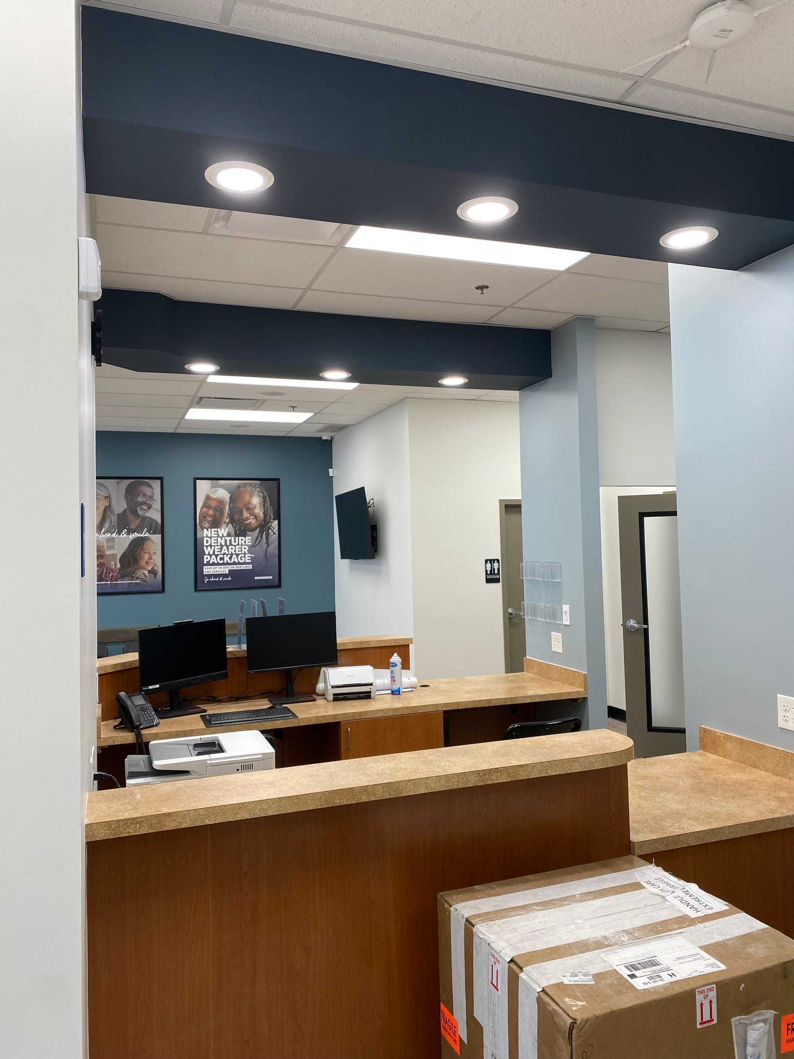 Affordable Dentures & Implants, a hospital painting project completed by Straight Line Painting