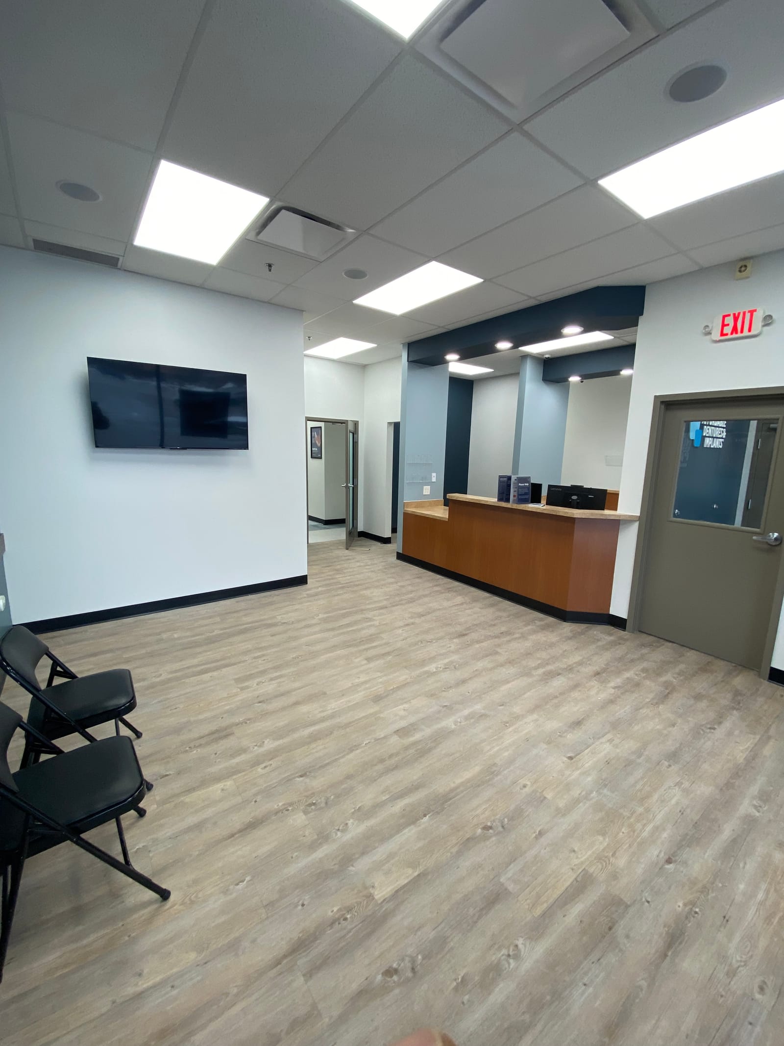Affordable Dentures & Implants, a hospital painting project completed by Straight Line Painting