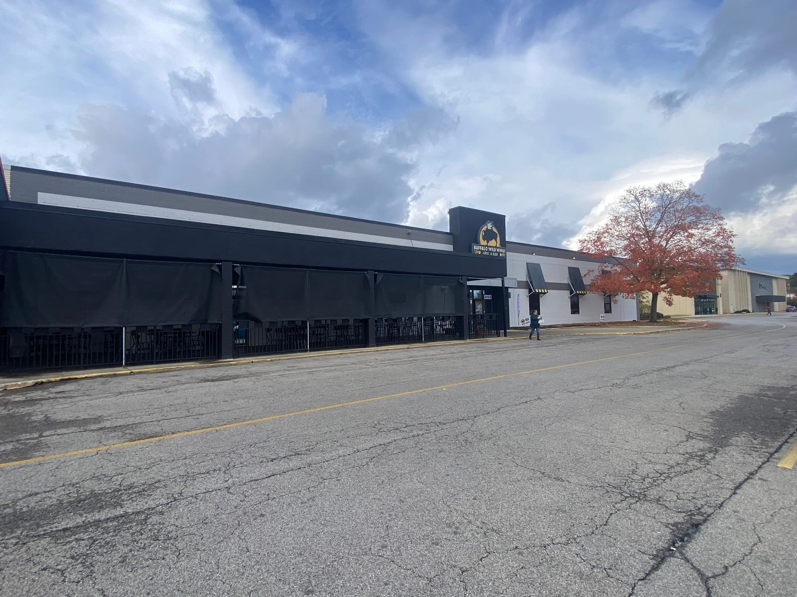 Full exterior elevation of a repainted Buffalo Wild Wings storefront against open sky