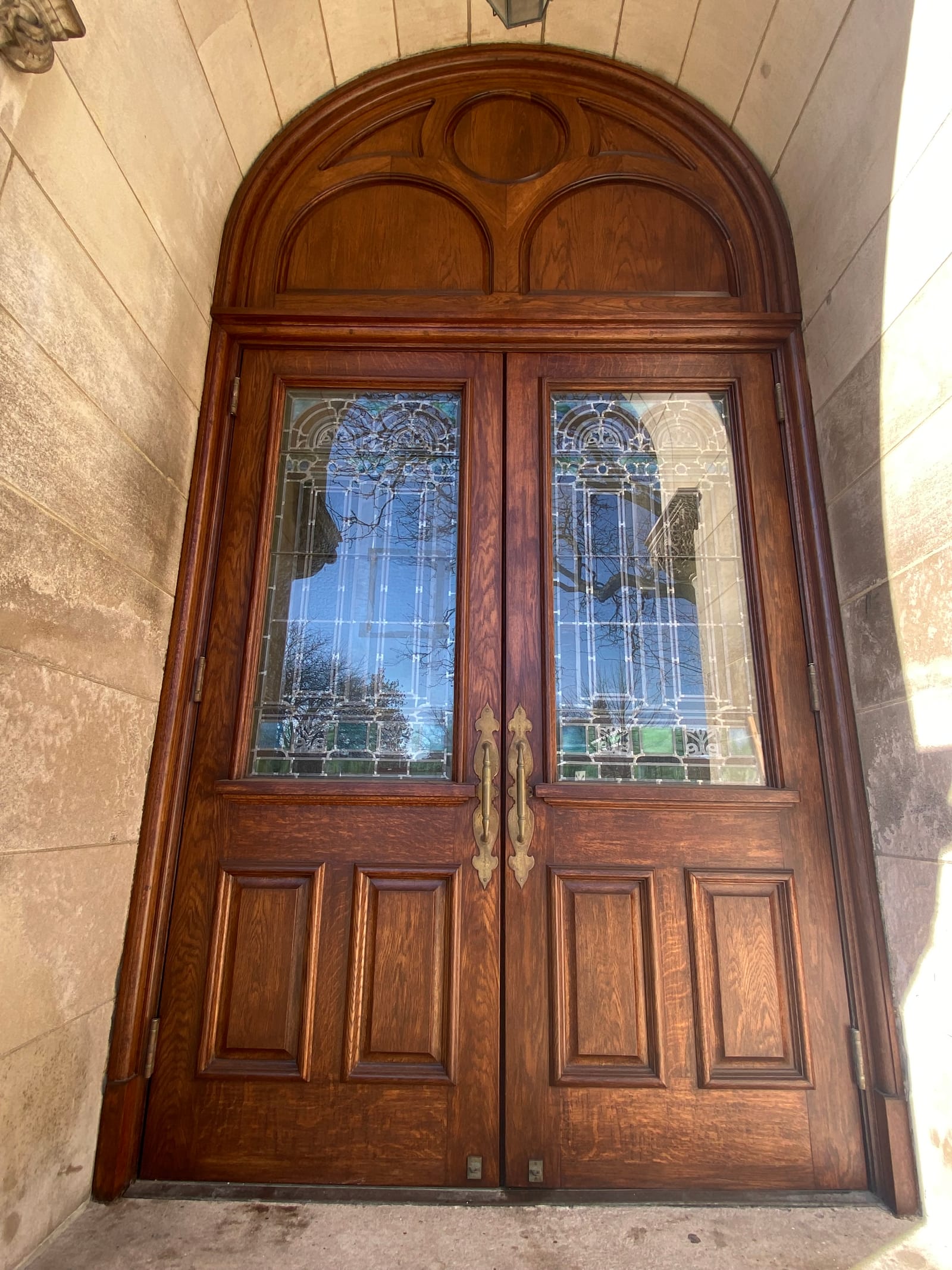 A 116-year-old building's historic entrance, a renovation painting project completed by Straight Line Painting