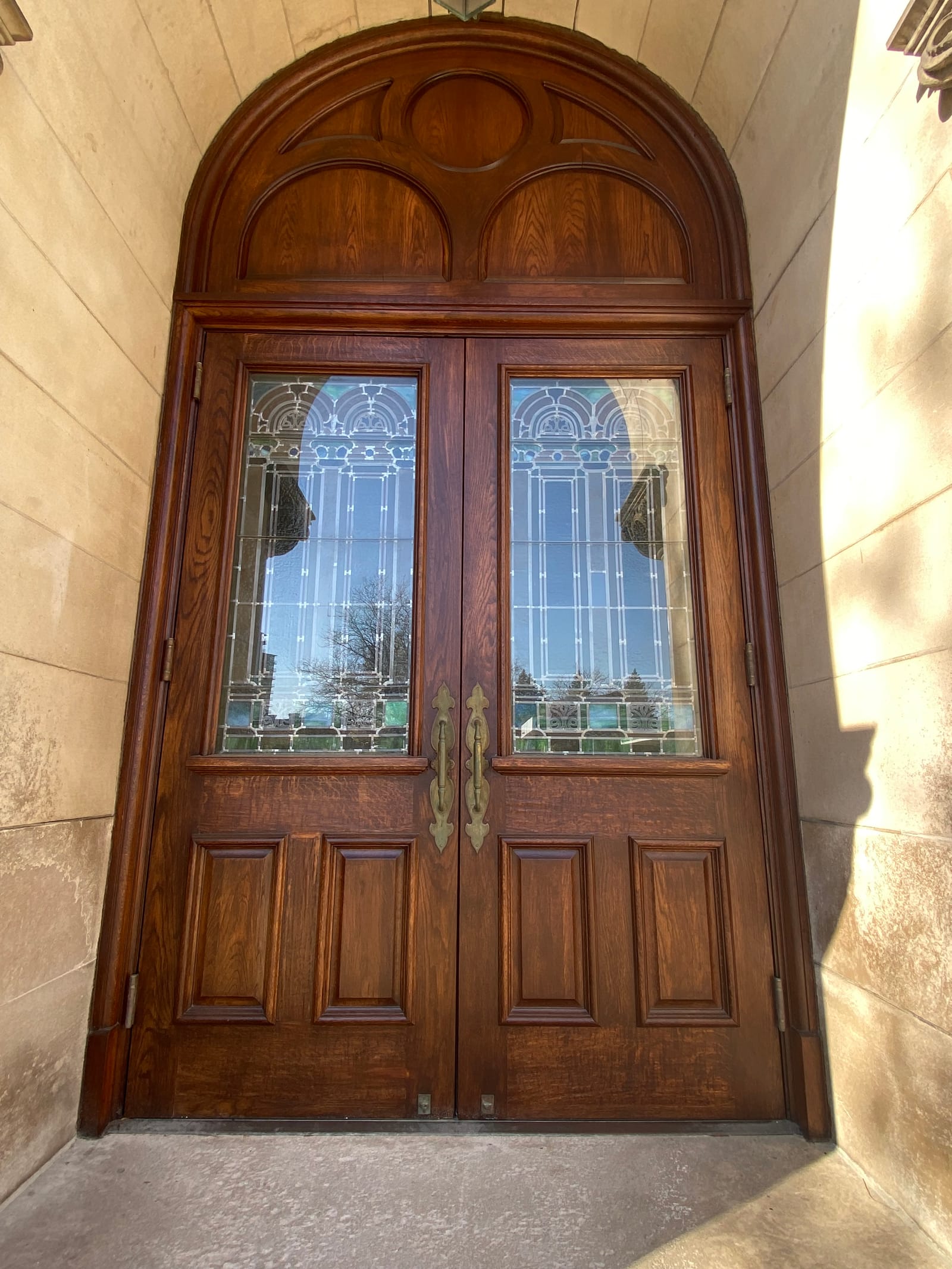 A 116-year-old building's historic entrance, a renovation painting project completed by Straight Line Painting