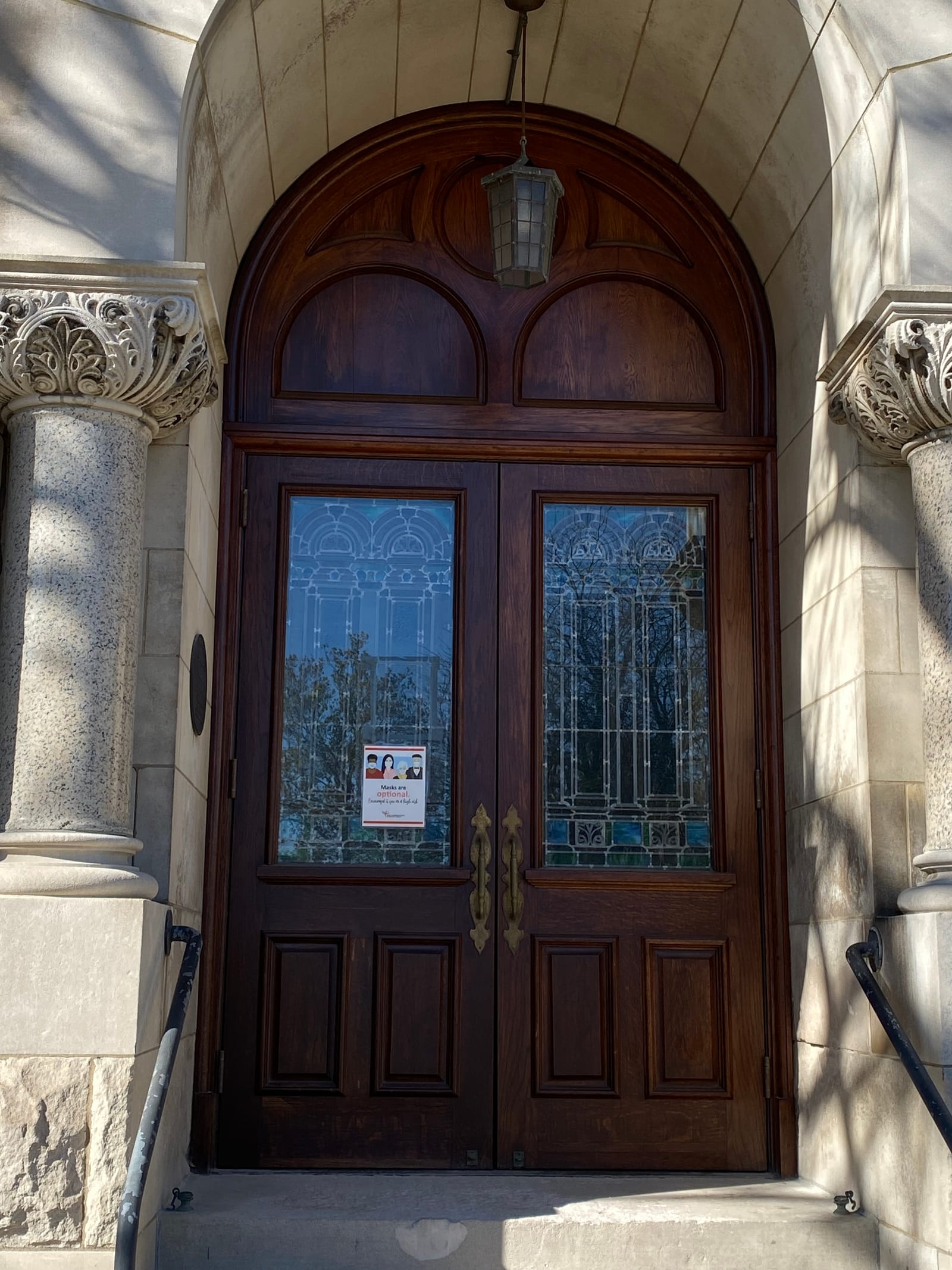 A 116-year-old building's historic entrance, a renovation painting project completed by Straight Line Painting