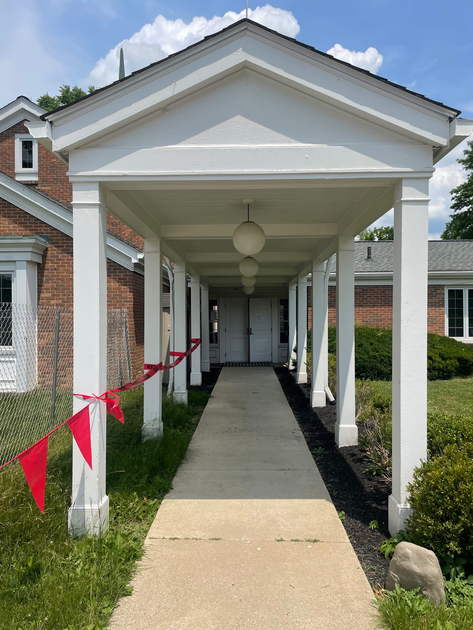 A 116-year-old building's historic entrance, a renovation painting project completed by Straight Line Painting