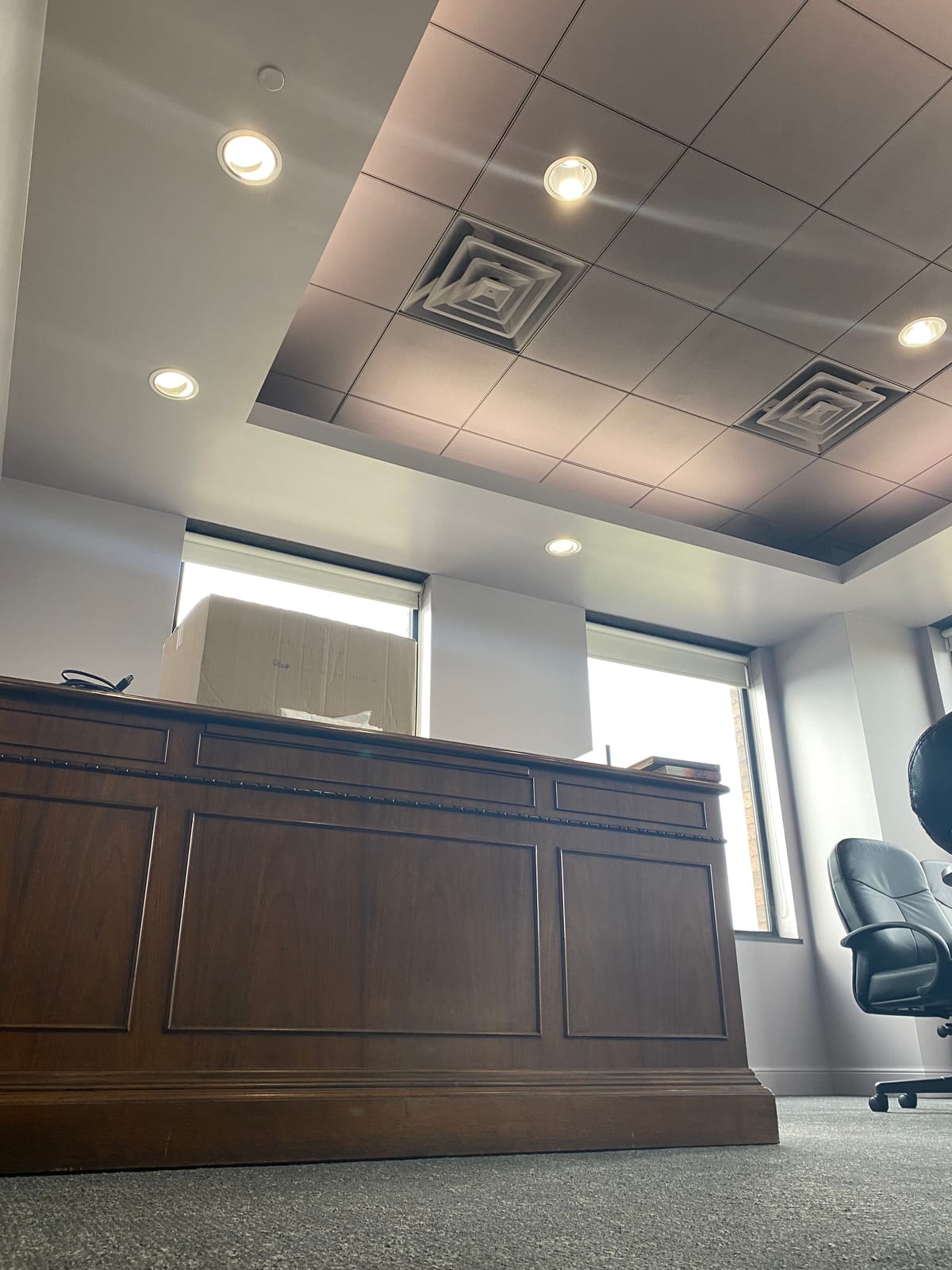 Finished reception desk and ceiling in a law office tenant build-out