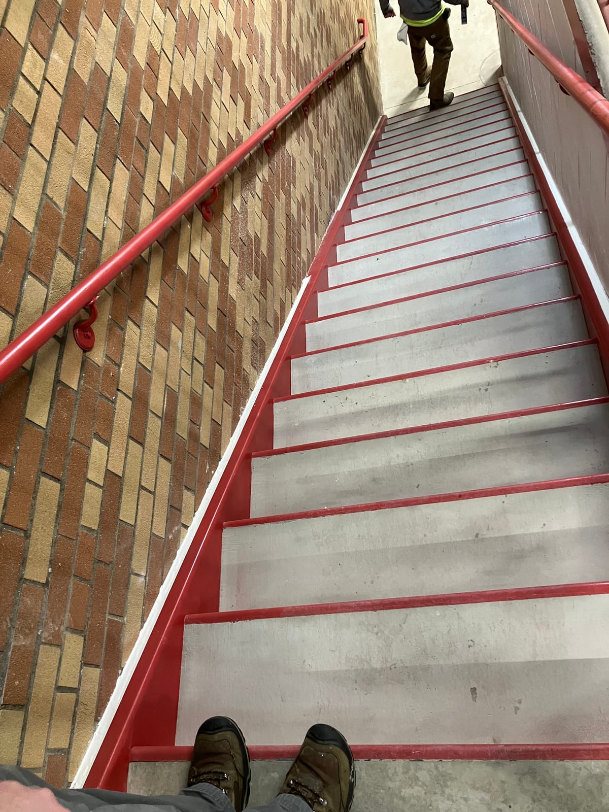 Freshly painted stairwell and handrail at Theodore Roosevelt High School